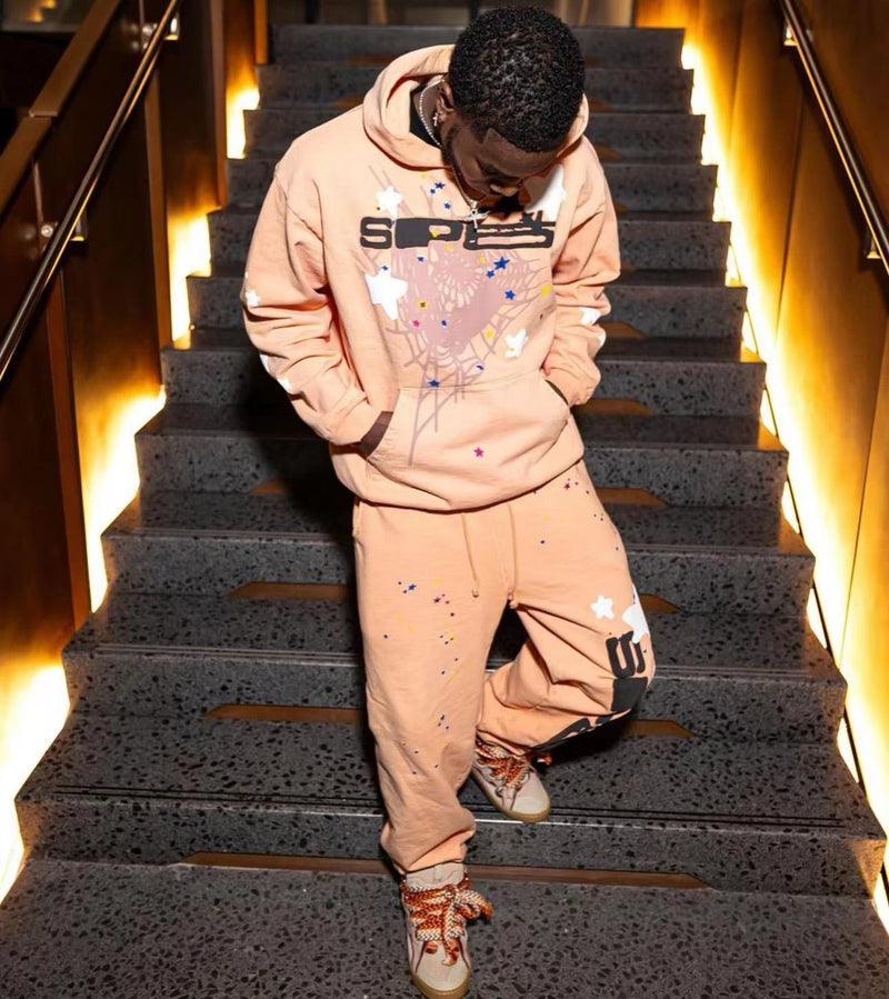 SP5DER Peach Hoodie – Bold Designer Streetwear with Web Graphic