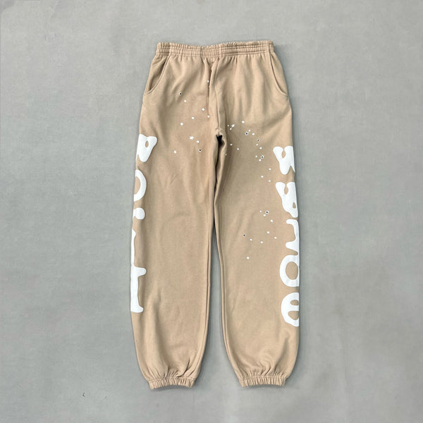 SP5DER Sand Beluga Pants – Neutral Streetwear Designer with Graphic Details