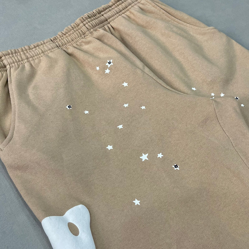 SP5DER Sand Beluga Pants – Neutral Streetwear Designer with Graphic Details