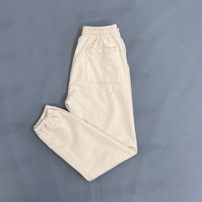 SP5DER Sand Beige Pants – Designer Streetwear with Graphic Details