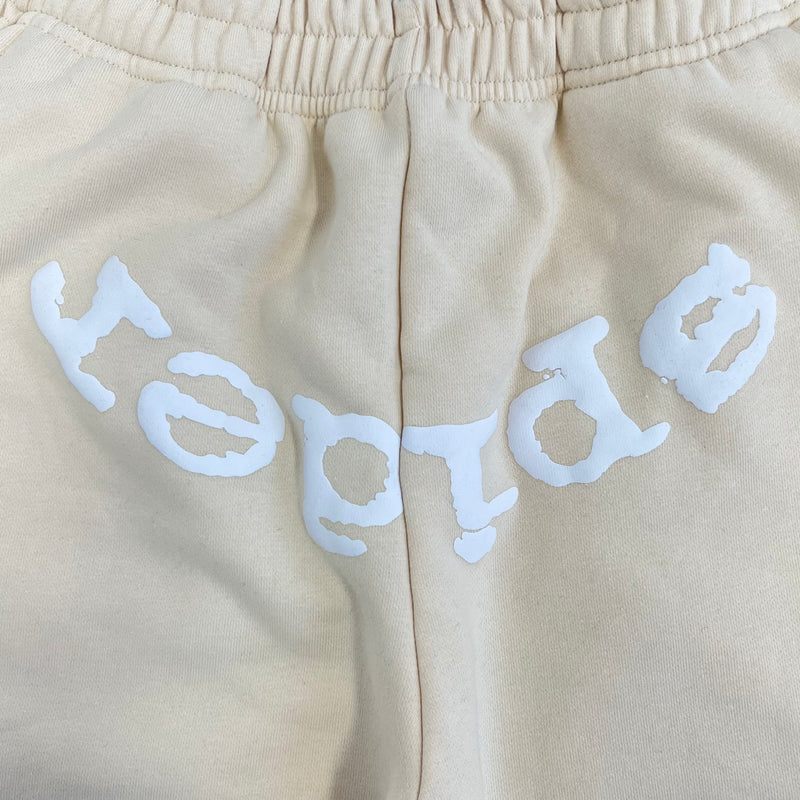 SP5DER Sand Beige Pants – Designer Streetwear with Graphic Details