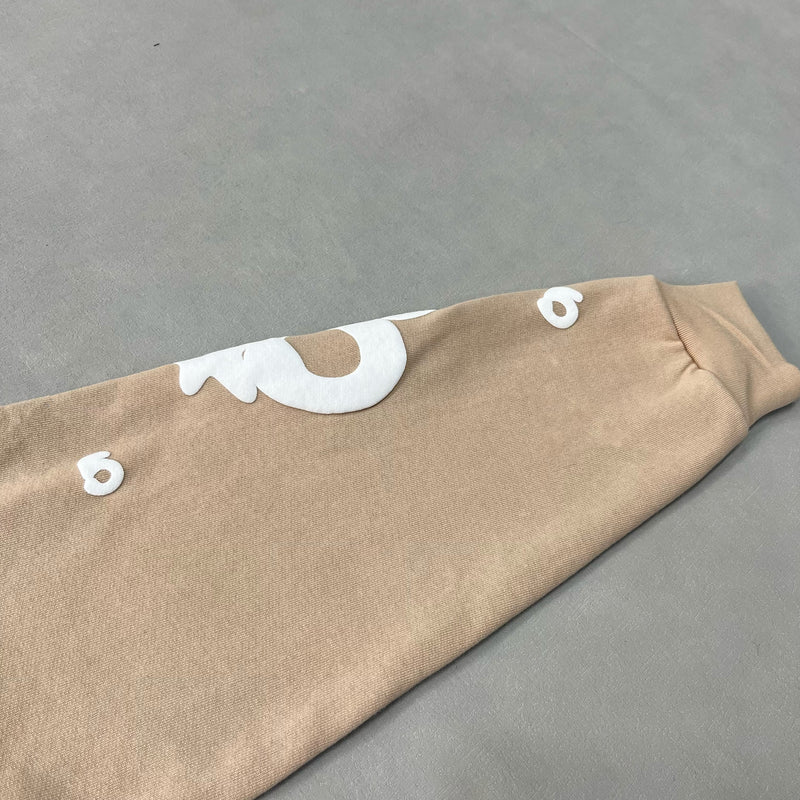 SP5DER Sand Beluga Pants – Neutral Streetwear Designer with Graphic Details